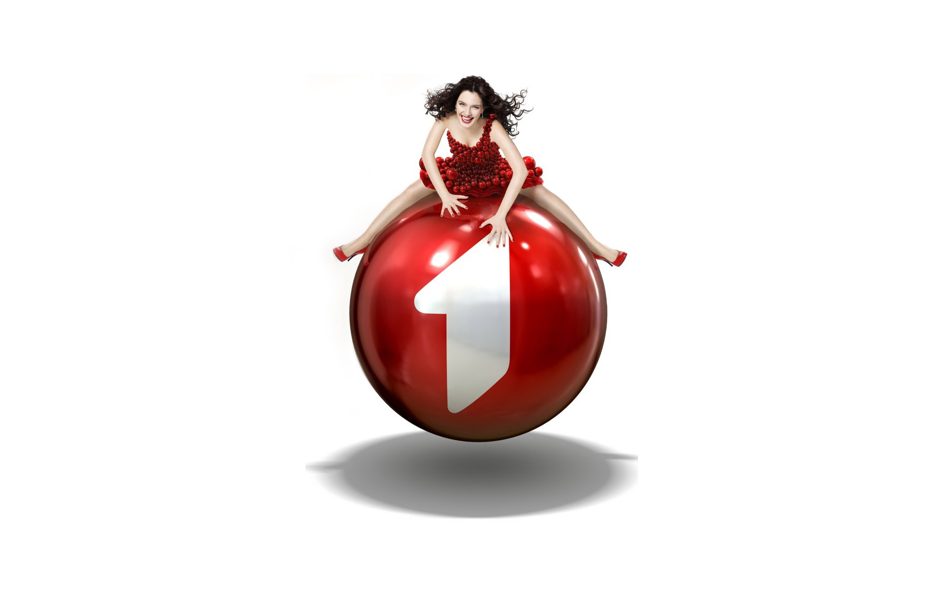 Girl on a red ball commercial Wallpaper